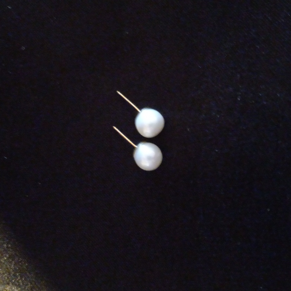 Authentic natural pearls on 14k Gold studs.